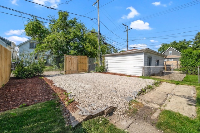 17 E 100th Pl, Chicago, IL 60628 - view of yard with a gate and a patio area