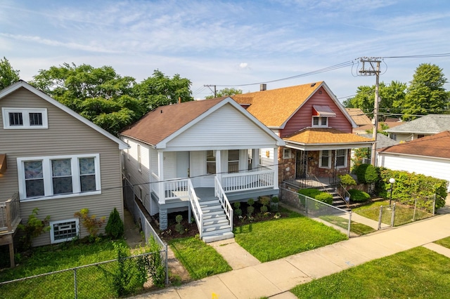 17 E 100th Pl, Chicago, IL 60628 - bungalow-style home with covered porch and stairs