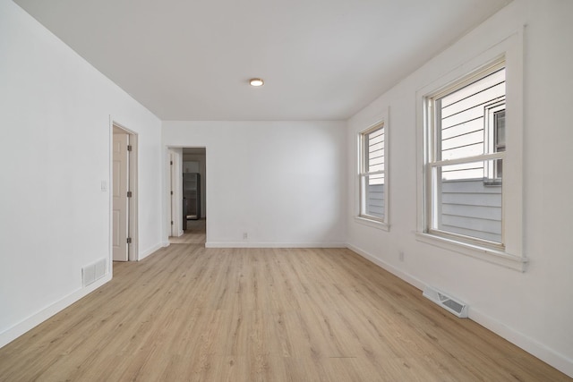 17 E 100th Pl, Chicago, IL 60628 - empty room with light wood-type flooring and baseboards