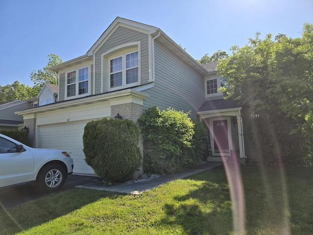 569 Arbor Ln, South Elgin, IL 60177 - view of side of property with a garage and a yard