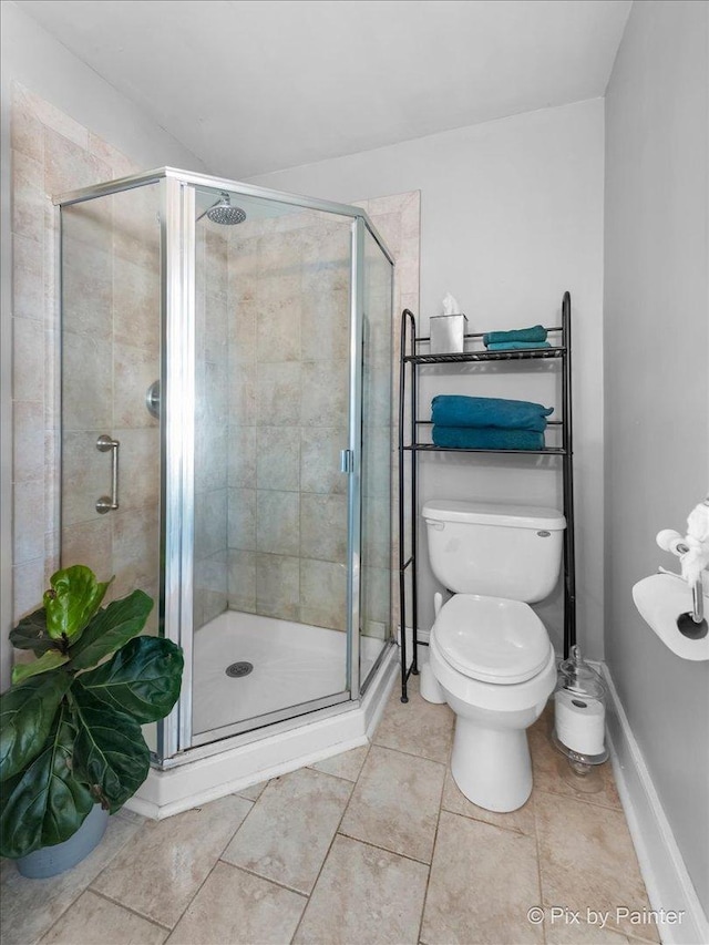 3N369 Lafox Rd, Saint Charles, IL 60175 - full bath featuring a stall shower, tile patterned floors, toilet, and baseboards