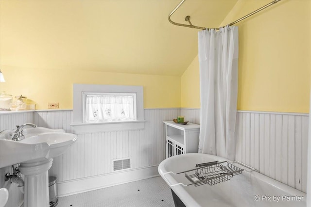 3N369 Lafox Rd, Saint Charles, IL 60175 - full bath with a wainscoted wall, a freestanding bath, and vaulted ceiling