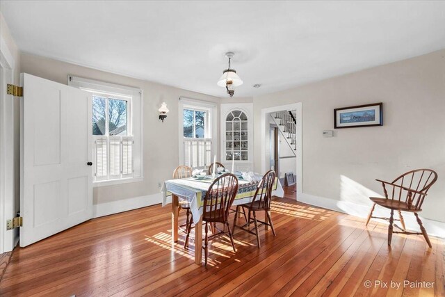 3N369 Lafox Rd, Saint Charles, IL 60175 - dining room featuring hardwood / wood-style floors, baseboards, and stairway