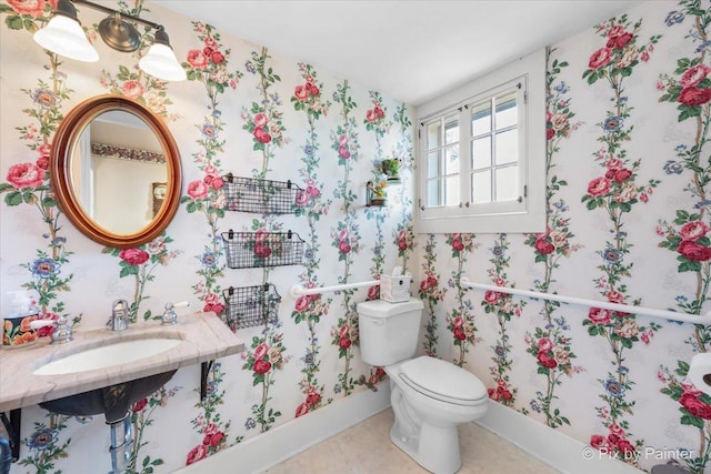 3N369 Lafox Rd, Saint Charles, IL 60175 - half bathroom with wallpapered walls, toilet, baseboards, a sink, and tile patterned flooring