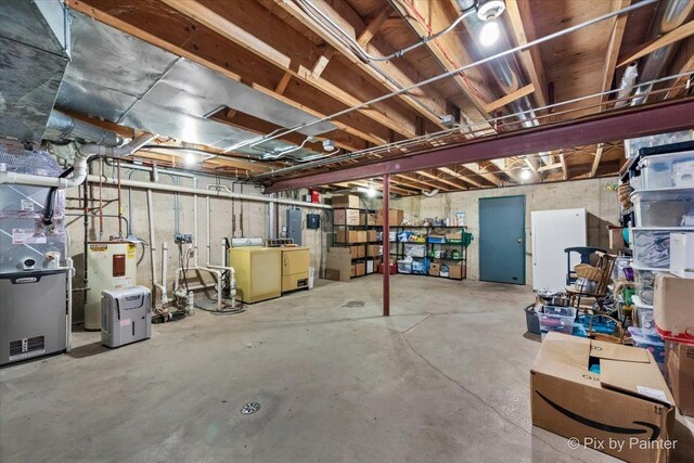 3N369 Lafox Rd, Saint Charles, IL 60175 - unfinished basement with independent washer and dryer, heating unit, and electric water heater