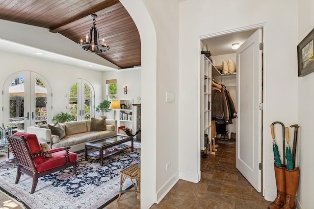 2037 Highland Ave, Wilmette, IL 60091 - living area featuring stone tile floors, baseboards, french doors, wooden ceiling, and lofted ceiling