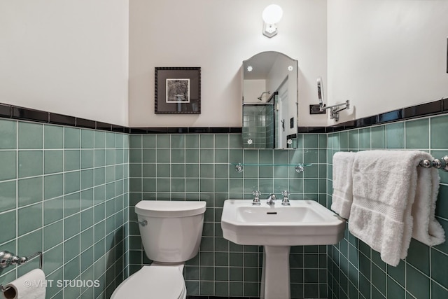 2037 Highland Ave, Wilmette, IL 60091 - bathroom with tile walls, toilet, and wainscoting