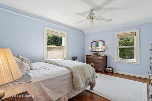 2037 Highland Ave, Wilmette, IL 60091 - bedroom with wood finished floors, baseboards, and a ceiling fan