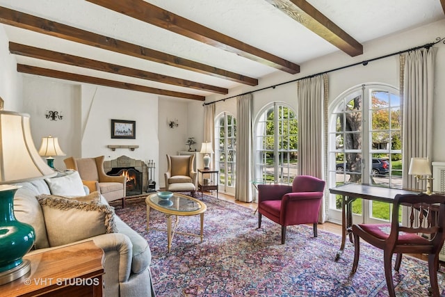 2037 Highland Ave, Wilmette, IL 60091 - living room with beamed ceiling and a warm lit fireplace