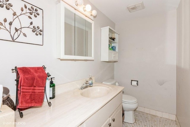 214 E Bailey Rd Unit J, Naperville, IL 60565 - bathroom with toilet, vanity, and tile patterned flooring