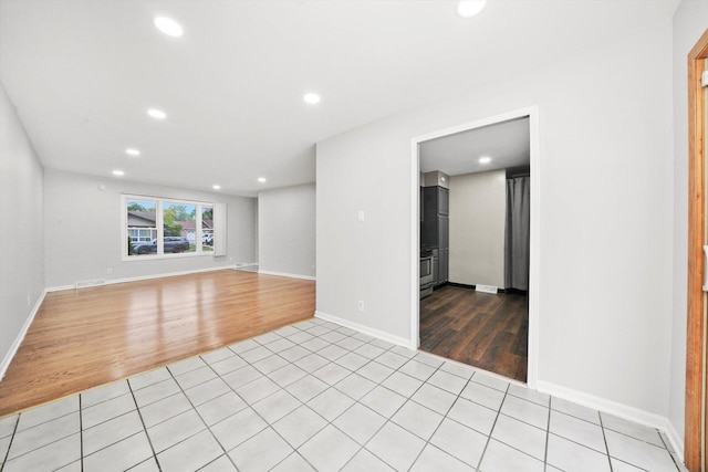 15245 Millard Ave, Midlothian, IL 60445 - unfurnished room featuring light wood finished floors, recessed lighting, and baseboards