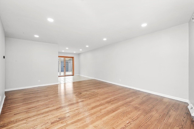 15245 Millard Ave, Midlothian, IL 60445 - unfurnished room with recessed lighting, light wood finished floors, and baseboards