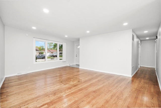 15245 Millard Ave, Midlothian, IL 60445 - spare room featuring recessed lighting, wood finished floors, and baseboards