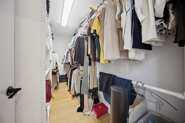 9013 Charing Cross Rd, Woodridge, IL 60517 - walk in closet with wood finished floors