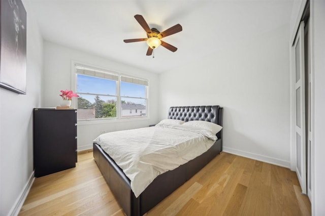 9013 Charing Cross Rd, Woodridge, IL 60517 - bedroom with light wood-style floors, baseboards, and a ceiling fan