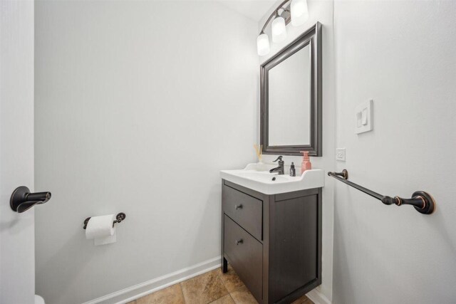 9013 Charing Cross Rd, Woodridge, IL 60517 - bathroom with vanity and baseboards