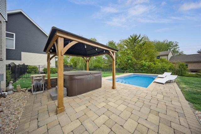 9013 Charing Cross Rd, Woodridge, IL 60517 - view of swimming pool featuring a gazebo, a hot tub, a patio area, and a fenced backyard