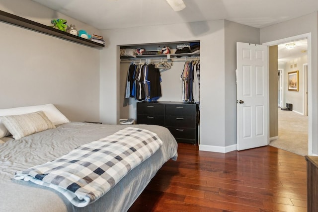 915 Eaton Ct, Lake Villa, IL 60046 - bedroom featuring dark wood finished floors, a closet, and baseboards