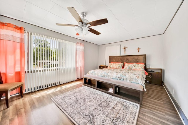 3724 W 135th St, Robbins, IL 60472 - bedroom with wood finished floors, a ceiling fan, and baseboards