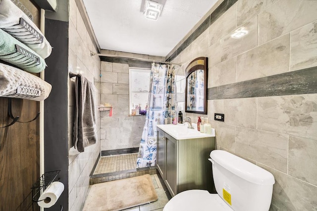 3724 W 135th St, Robbins, IL 60472 - full bath with tile walls, tiled shower, toilet, and vanity