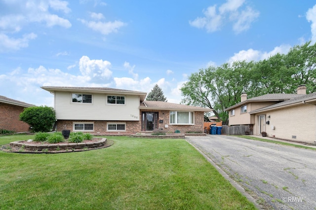 1236 N Fischer Dr, Addison, IL 60101 - tri-level home with asphalt driveway and brick siding