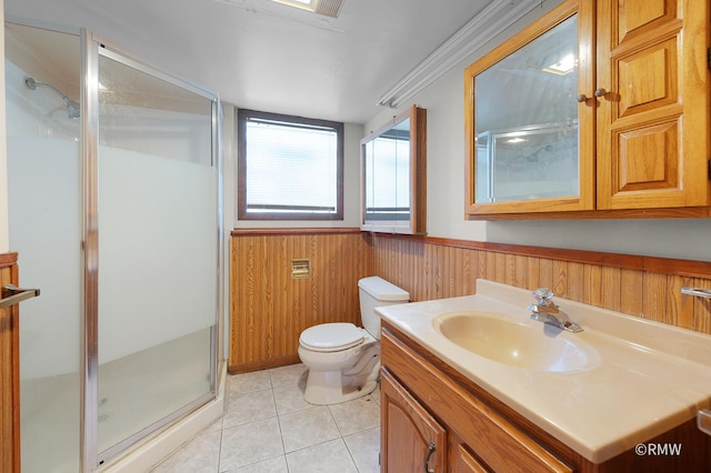 1236 N Fischer Dr, Addison, IL 60101 - full bath featuring a wainscoted wall, a shower stall, vanity, tile patterned floors, and toilet