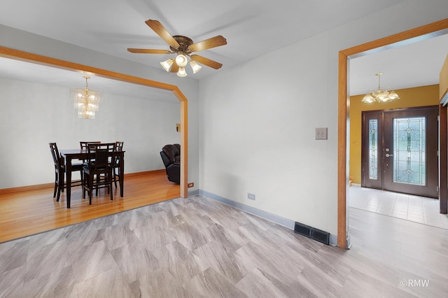 1236 N Fischer Dr, Addison, IL 60101 - dining room with a chandelier, baseboards, and ceiling fan