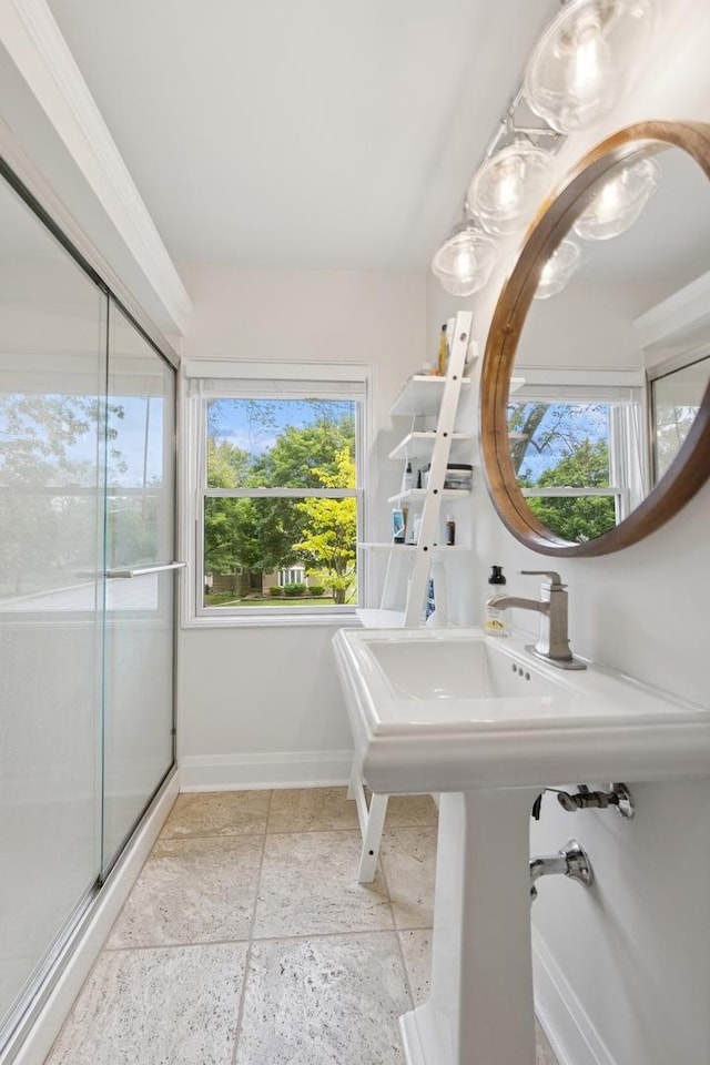 340 S Grant St, Westmont, IL 60559 - bathroom with stone tile floors, baseboards, and an enclosed shower