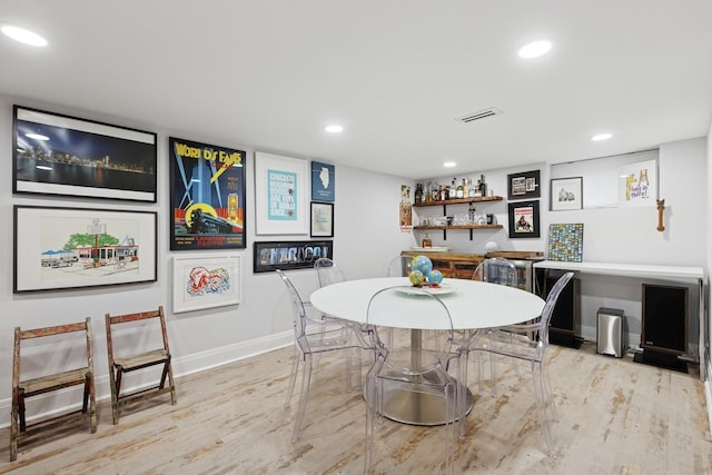 340 S Grant St, Westmont, IL 60559 - dining area with wood finished floors, baseboards, a bar, and recessed lighting