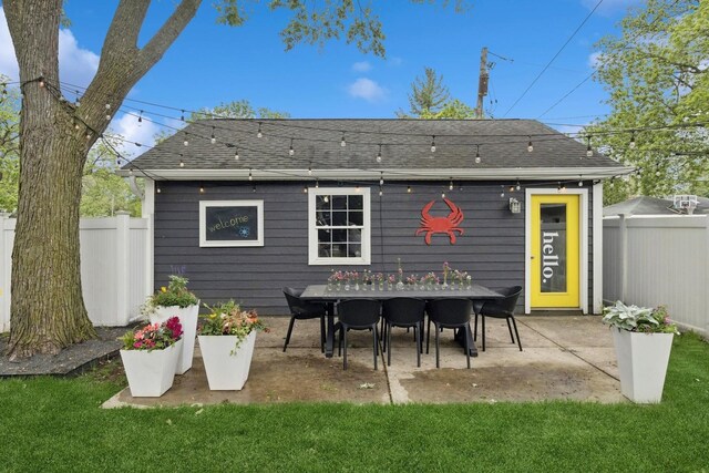 340 S Grant St, Westmont, IL 60559 - rear view of property featuring roof with shingles and a patio