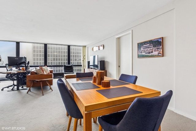 900 N Lake Shore Dr Unit 2906, Chicago, IL 60611 - dining space featuring light carpet