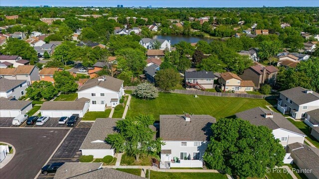 1565 Cornell Pl, Hoffman Estates, IL 60169 - aerial perspective of suburban area with a large body of water