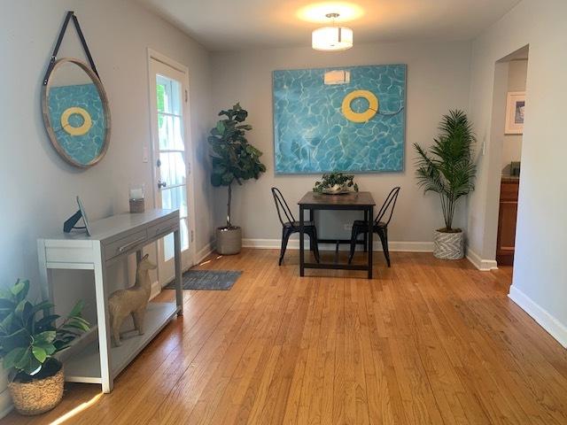 810 Skokie Blvd Unit C, Wilmette, IL 60091 - dining area with light wood-style floors and baseboards