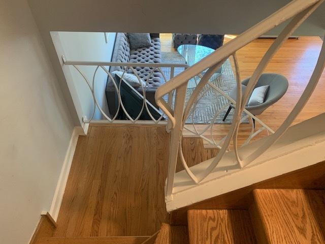 810 Skokie Blvd Unit C, Wilmette, IL 60091 - stairs featuring wood finished floors and baseboards