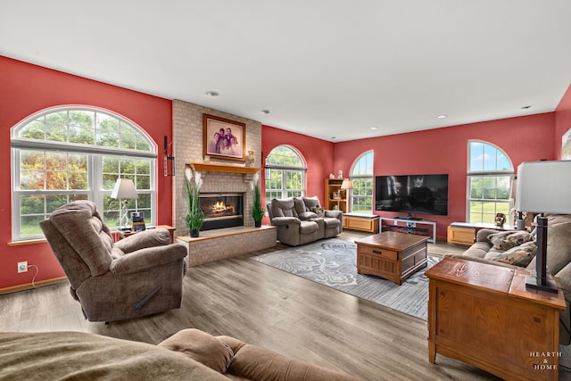 5008 Country Springs Dr, Johnsburg, IL 60051 - living room featuring a fireplace, wood finished floors, and recessed lighting