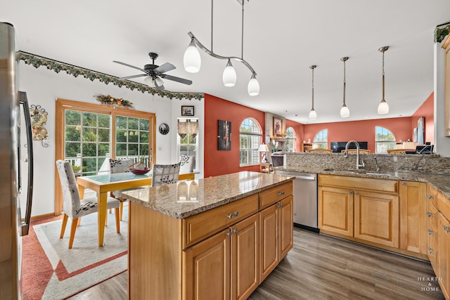 5008 Country Springs Dr, Johnsburg, IL 60051 - kitchen with stainless steel dishwasher, light wood finished floors, and plenty of natural light
