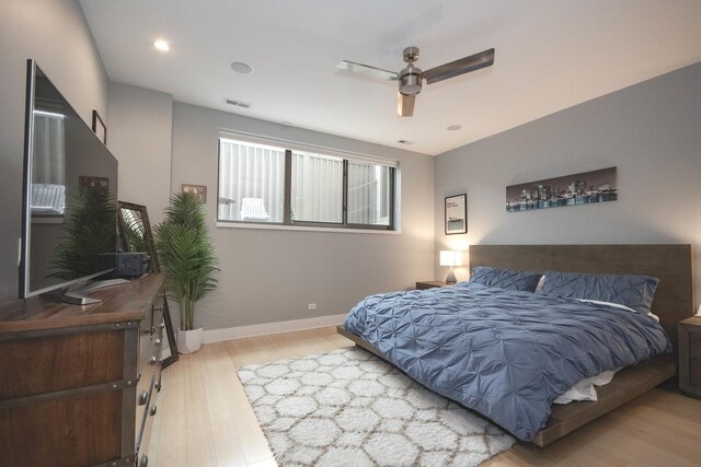 1529 W Chestnut St Unit 102, Chicago, IL 60642 - bedroom with wood finished floors, baseboards, and a ceiling fan