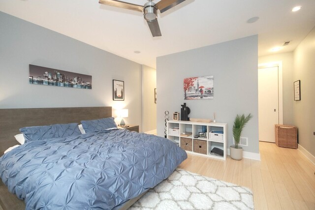 1529 W Chestnut St Unit 102, Chicago, IL 60642 - bedroom with wood finished floors, ceiling fan, recessed lighting, and baseboards