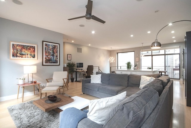 1529 W Chestnut St Unit 102, Chicago, IL 60642 - living room with light wood-type flooring, a ceiling fan, recessed lighting, a desk, and baseboards