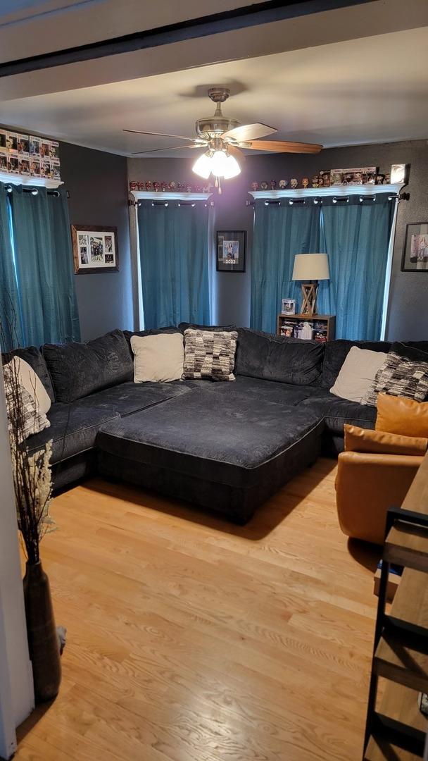 401 Dixon Ave, Rock Falls, IL 61071 - living area with a ceiling fan and wood finished floors