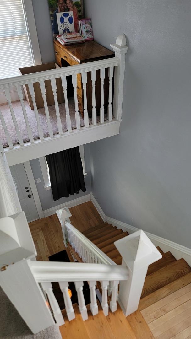 401 Dixon Ave, Rock Falls, IL 61071 - staircase with baseboards and wood finished floors