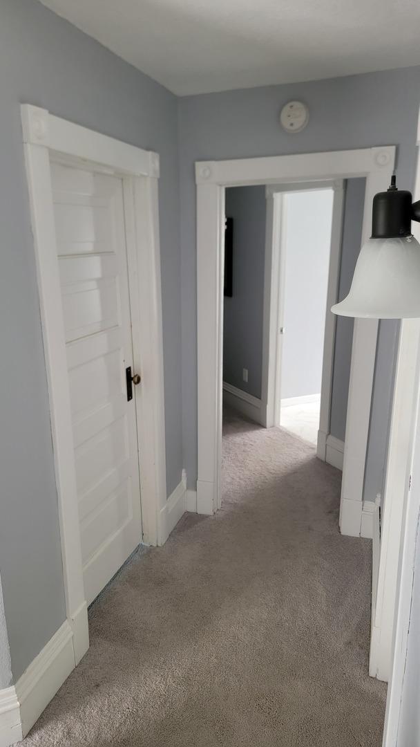 401 Dixon Ave, Rock Falls, IL 61071 - hall featuring carpet flooring and baseboards