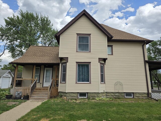 401 Dixon Ave, Rock Falls, IL 61071 - view of front facade featuring a porch, a front yard, and a shingled roof