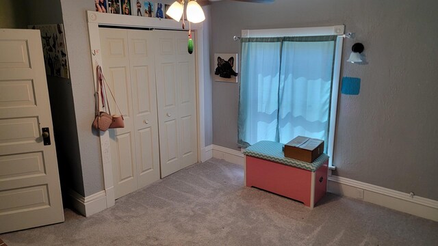 401 Dixon Ave, Rock Falls, IL 61071 - unfurnished bedroom with carpet flooring, a closet, and ceiling fan
