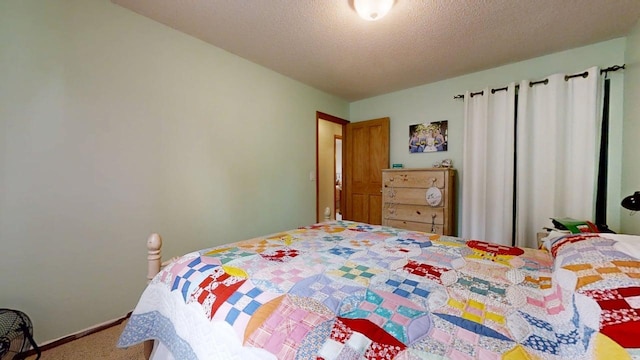 2702 Worcester Dr, Champaign, IL 61821 - bedroom with carpet and a textured ceiling