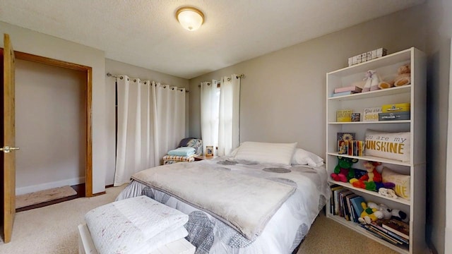 2702 Worcester Dr, Champaign, IL 61821 - bedroom featuring light colored carpet and baseboards
