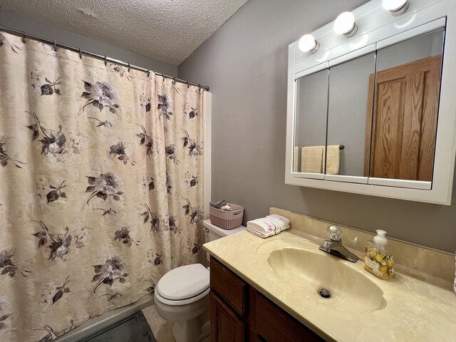 2702 Worcester Dr, Champaign, IL 61821 - full bathroom featuring a textured ceiling, vanity, toilet, and a shower with shower curtain