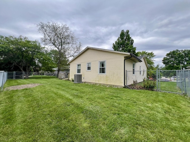 2702 Worcester Dr, Champaign, IL 61821 - back of house featuring a gate and cooling unit