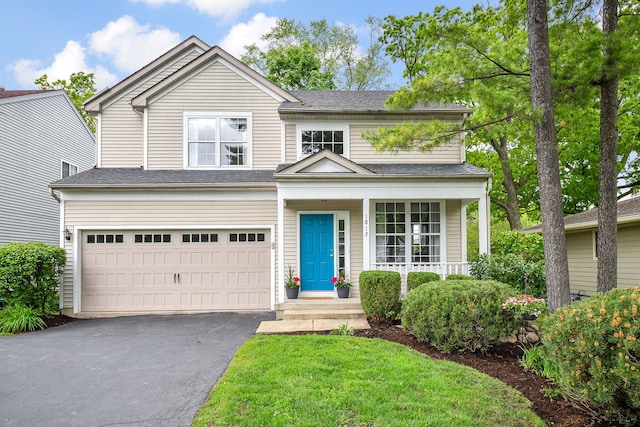 1817 2nd Pl, Saint Charles, IL 60174 - traditional-style house featuring driveway, a garage, and covered porch