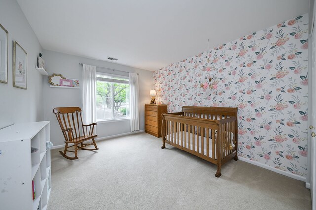 1817 2nd Pl, Saint Charles, IL 60174 - bedroom featuring carpet floors, baseboards, and a nursery area